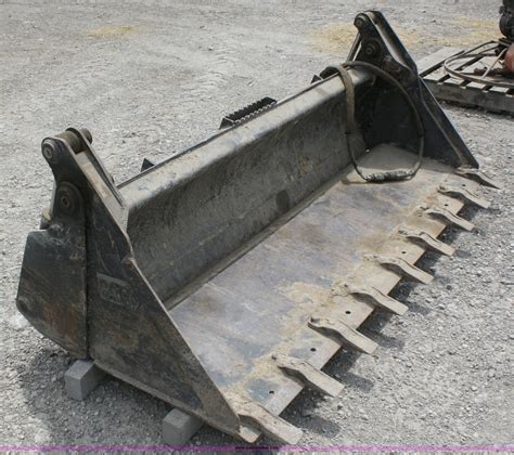 skid steer 4n1 bucket|caterpillar 4 in 1 bucket.